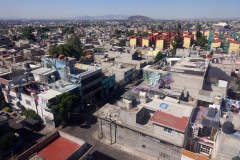 Utsikten från världens längsta (10,55 km) linbana för kollektivtrafik, linje 2 mellan Constitución de 1917 och Santa Marta, Mexico City.